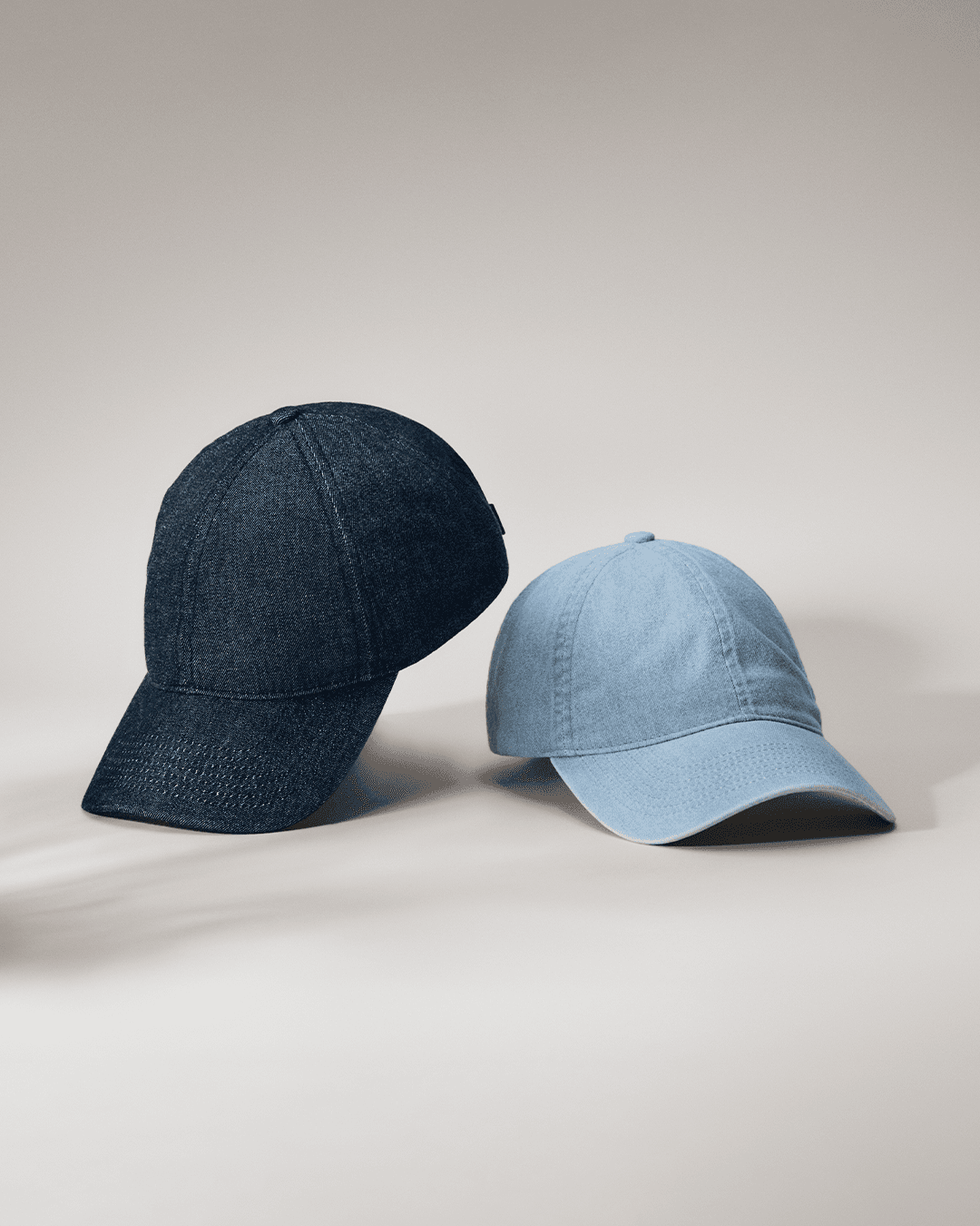 Front view of soft denim caps in blue and faded blue