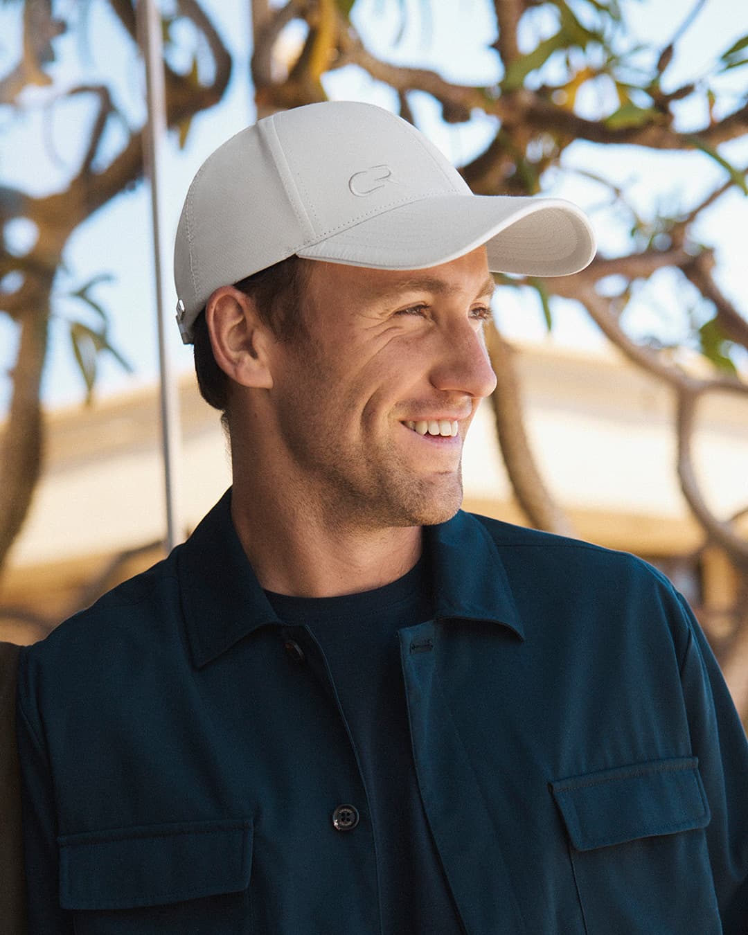 Casper Ruud wearing the off-court caps created in collaboration with Varsity Headwear