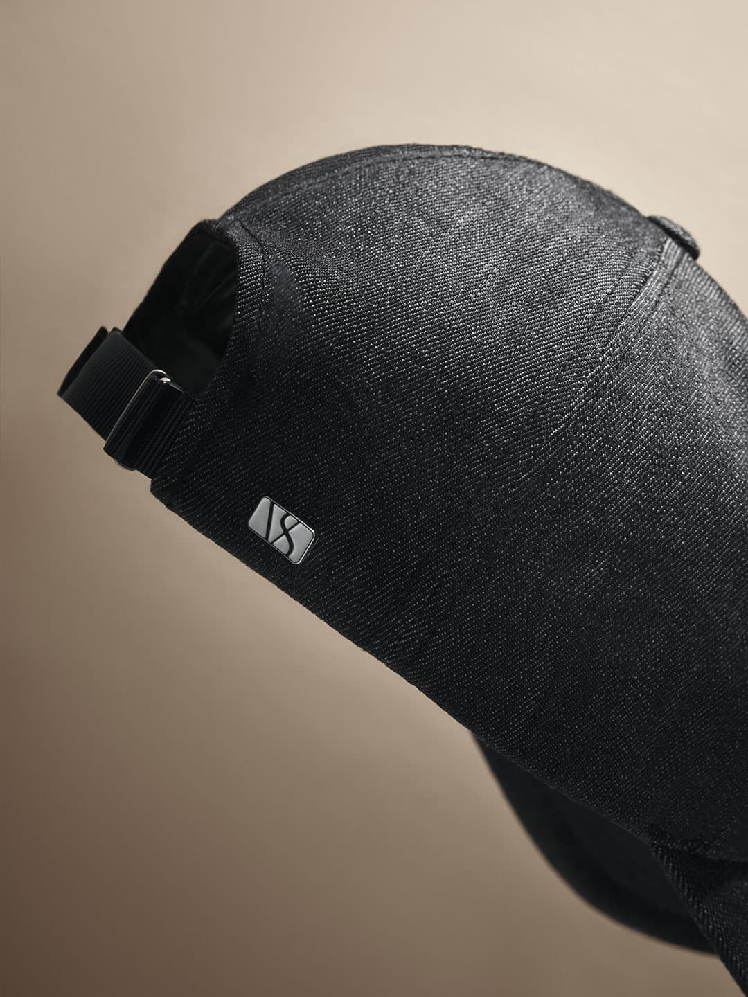 Side view of a legacy structured raw indigo denim cap from Varsity Headwear