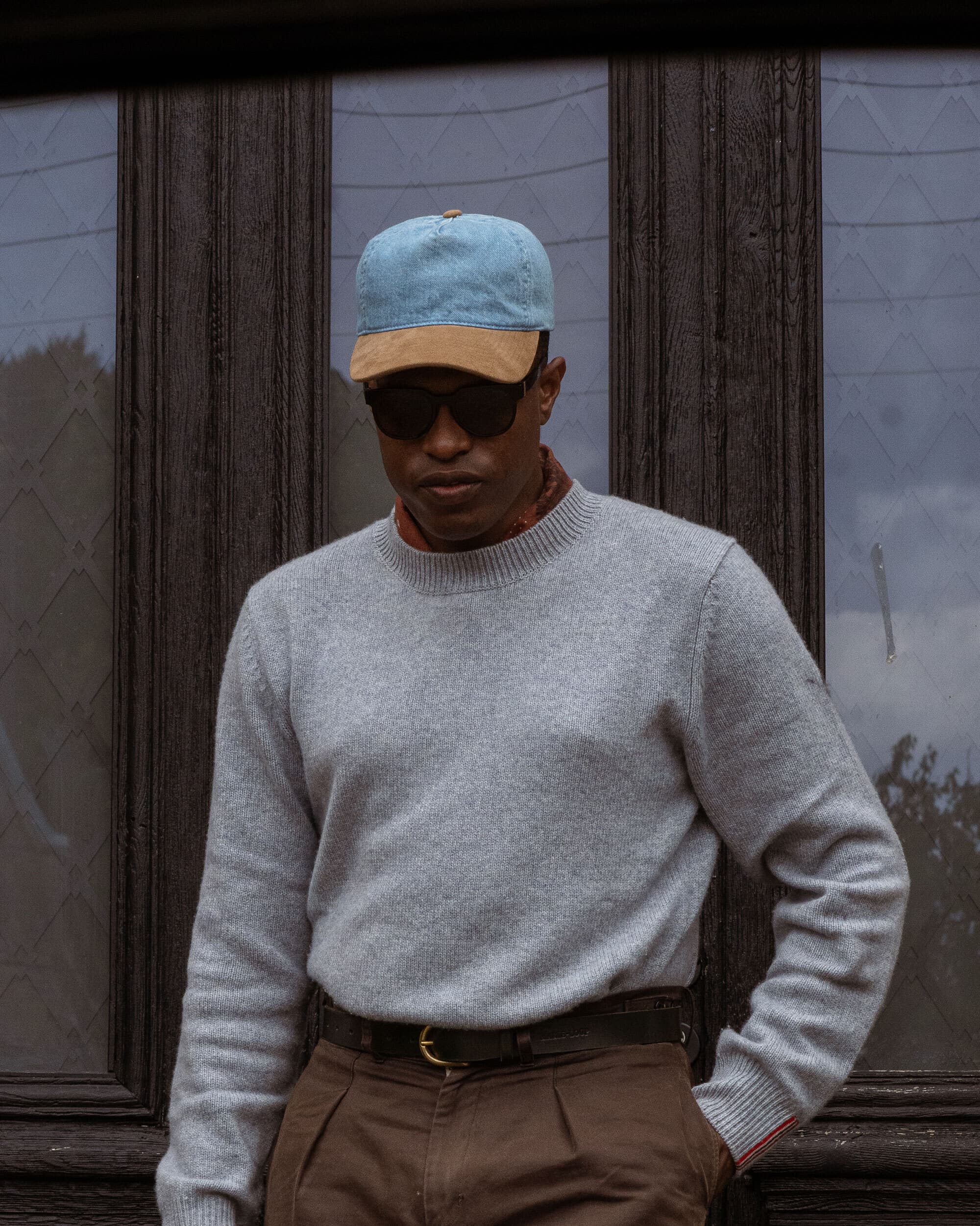 Front view of male wearing cruz soft dual cap in denim and alcantara