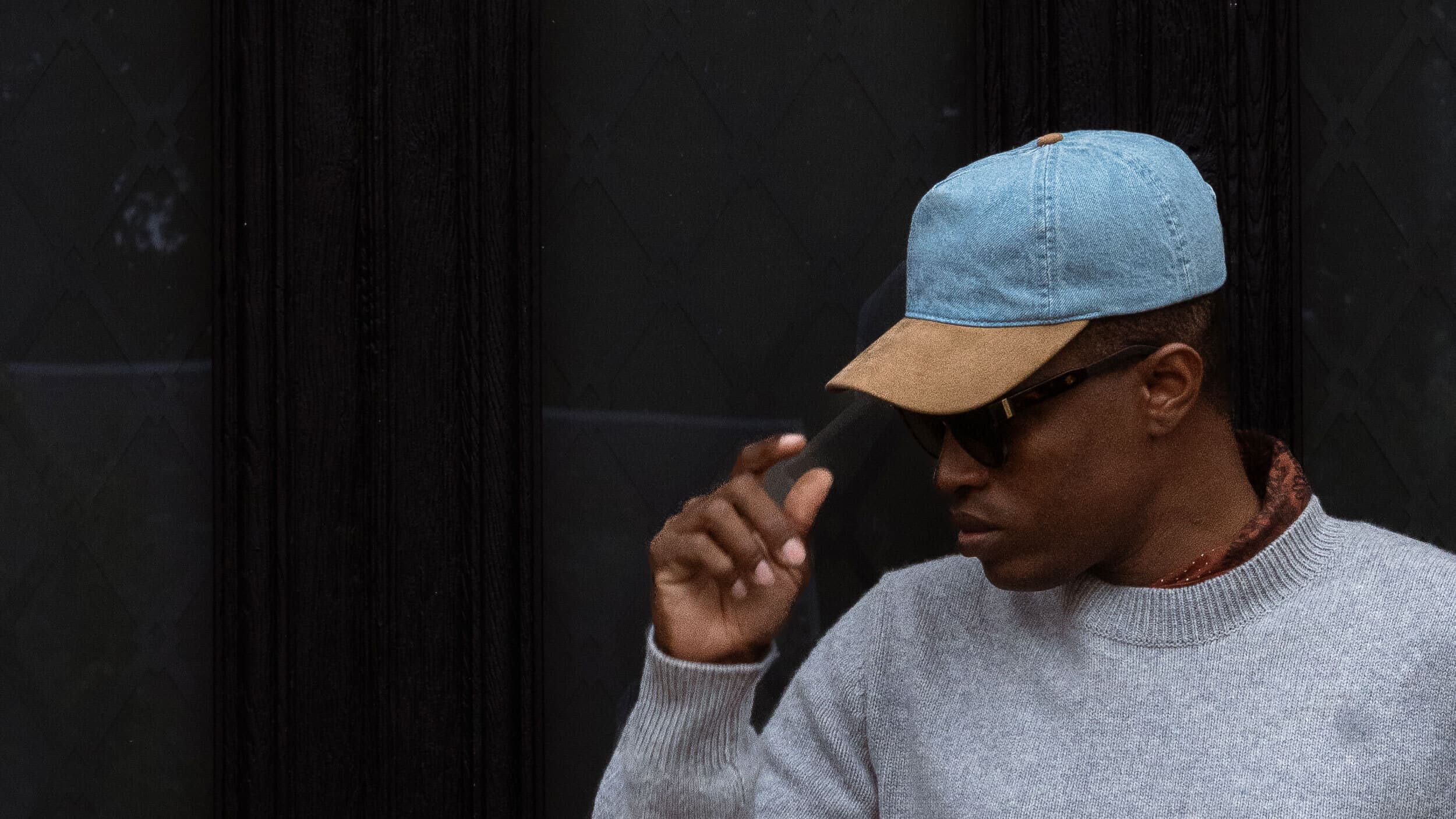 Side view of male wearing the Soft Cruz dual cap