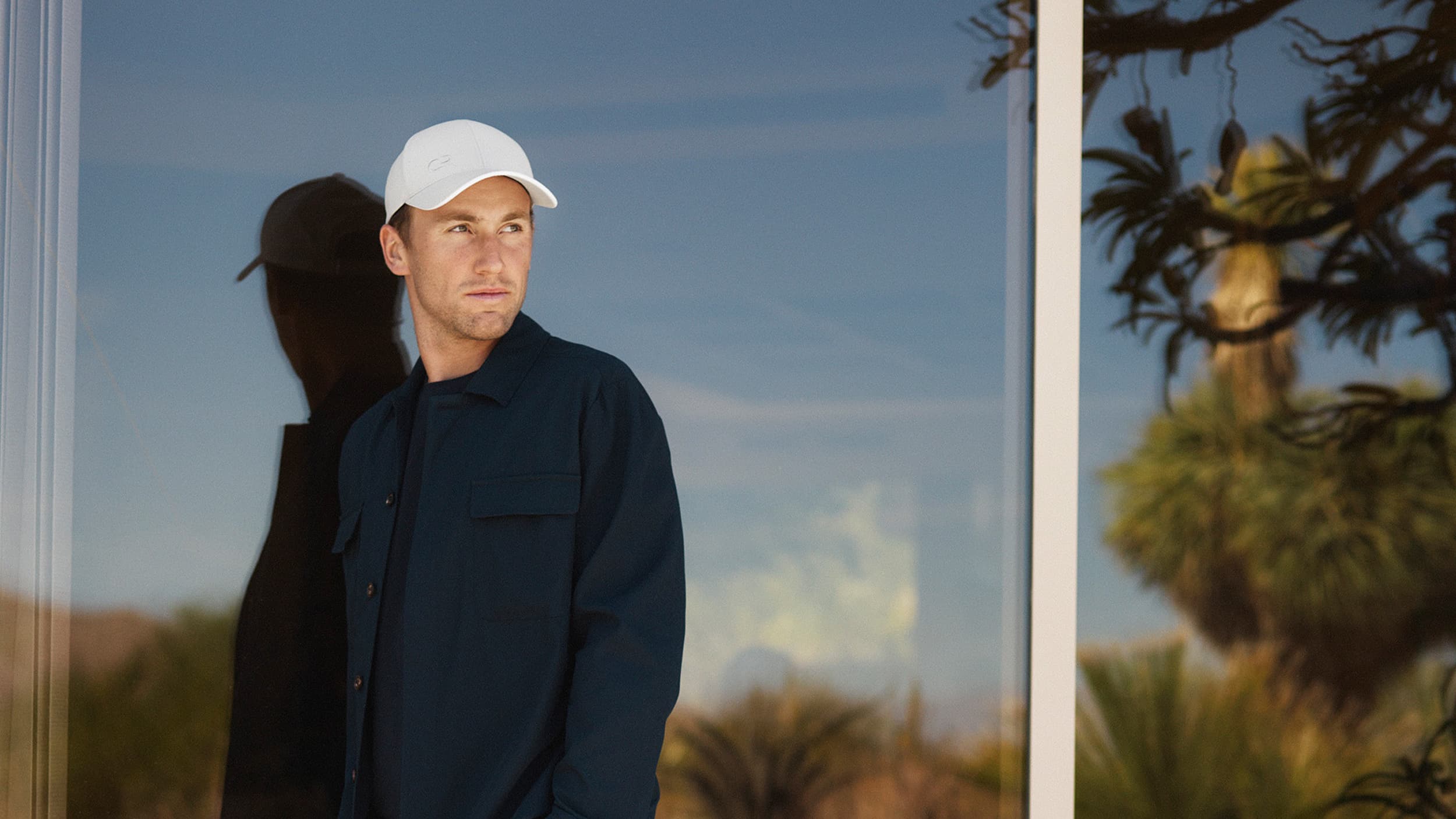 Tennis player Casper Ruud wearing the off-court cap from Varsity Headwear in beige