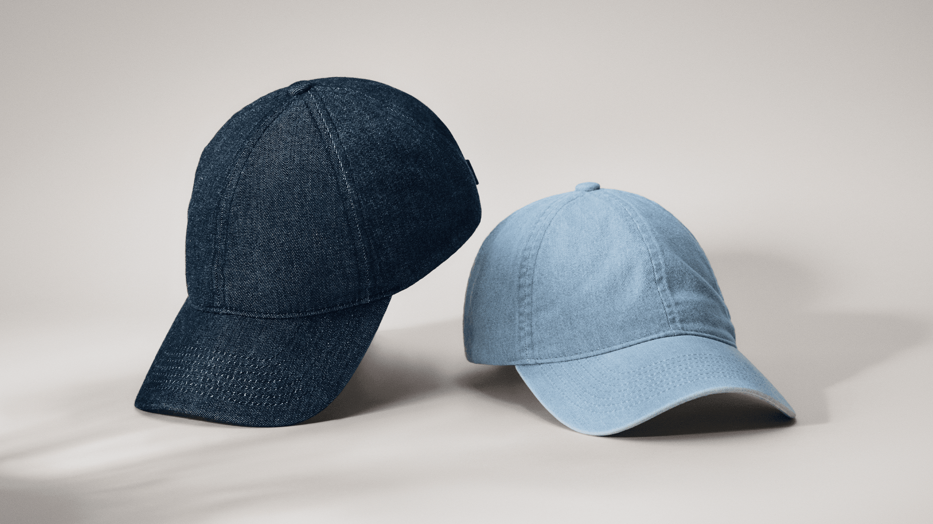 Front view of soft denim caps in blue and faded blue