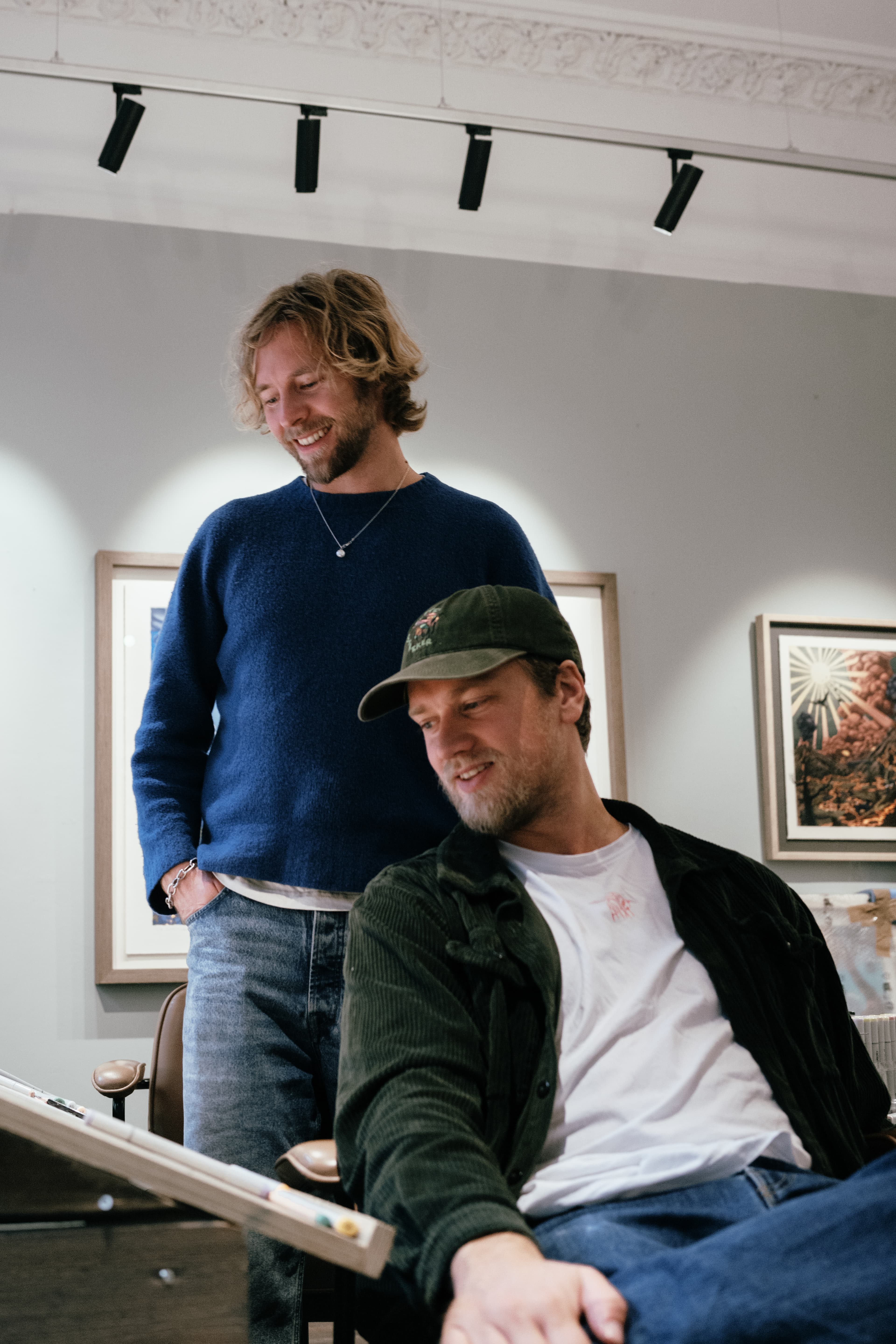 The norwegian artist duo guttestreker working on their special edition cap collaboration with varsity headwear