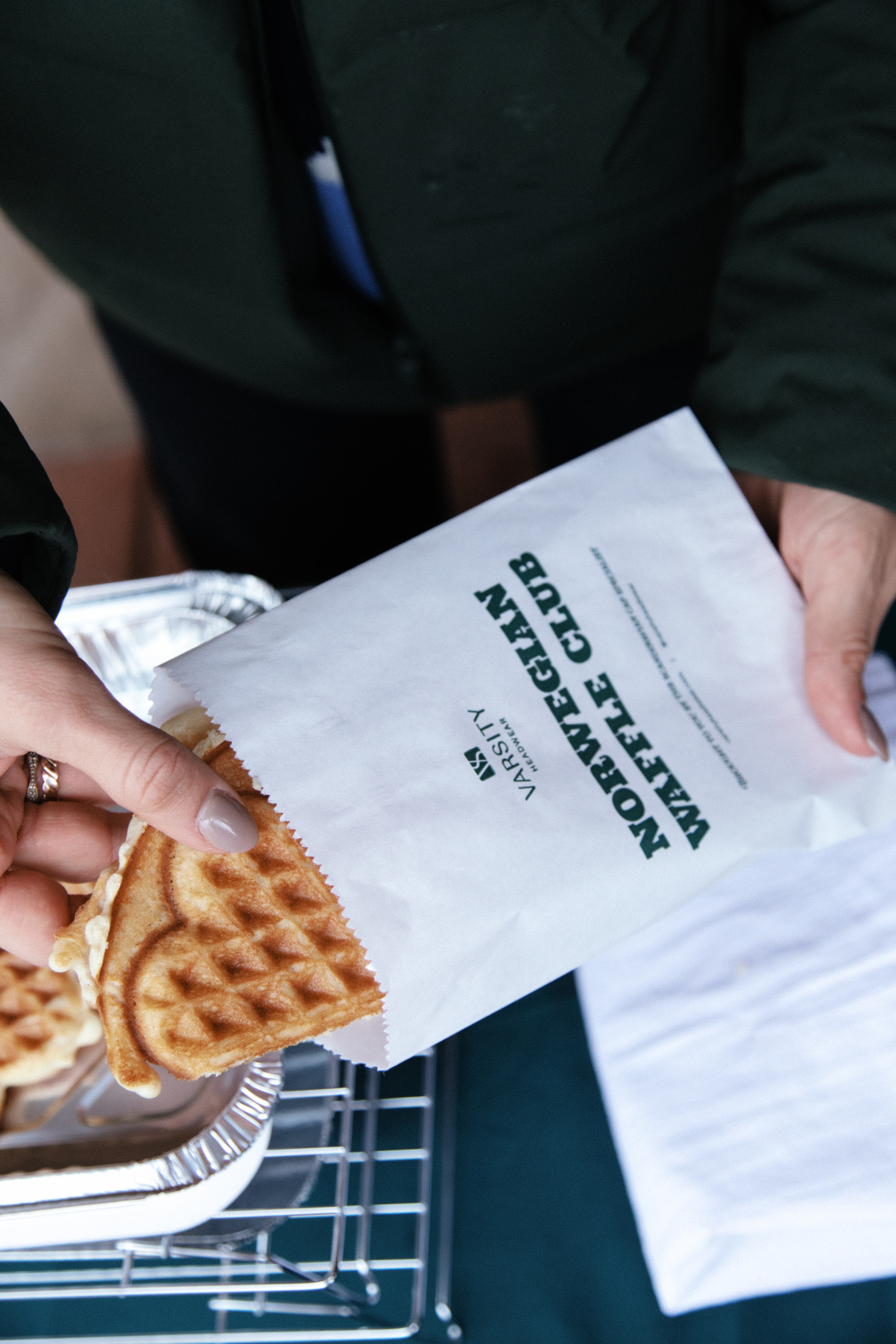 Varsity Headwear serving waffels to community at Gorsuch Aspen