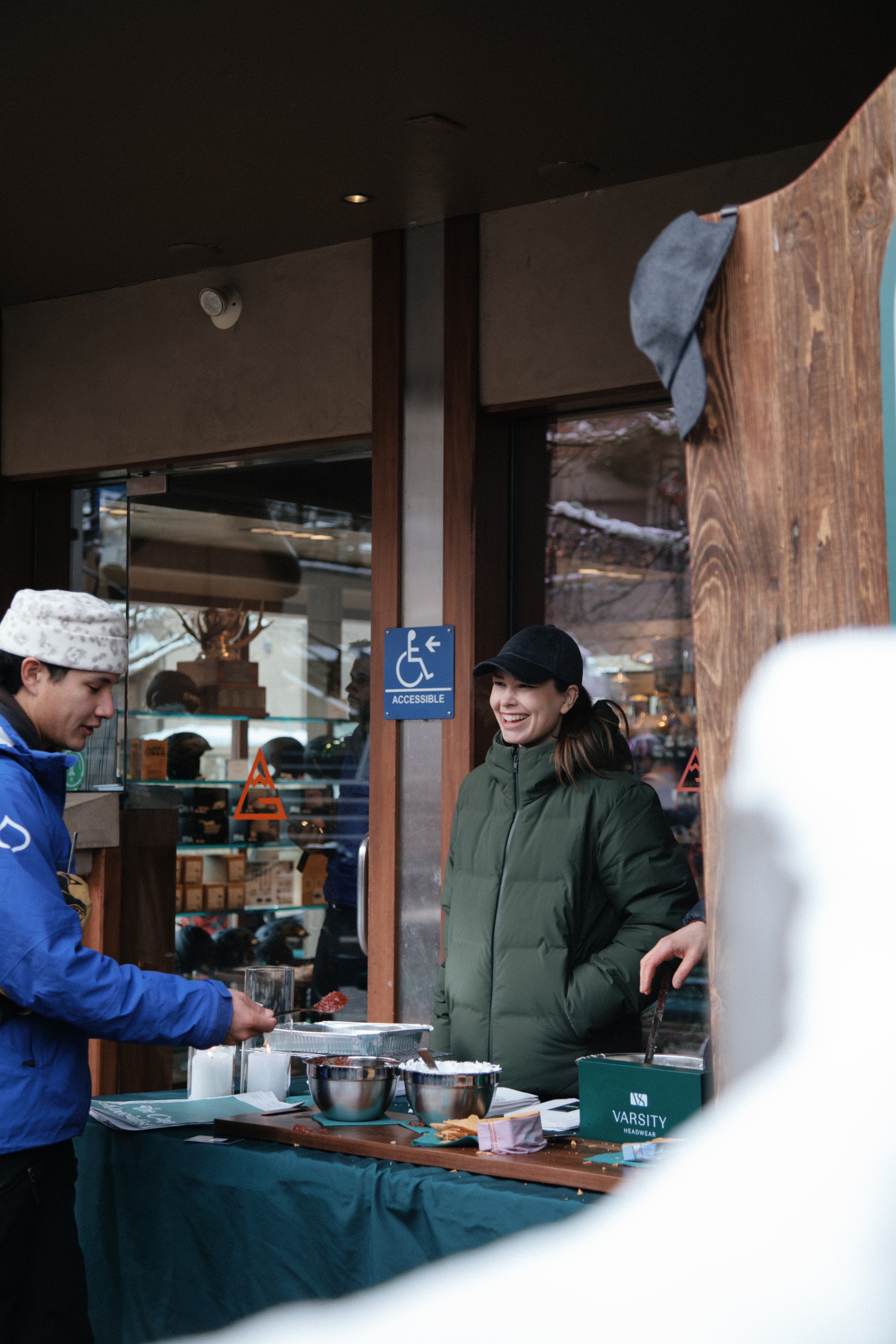 Front view of Varsity Headwear team serving waffels to community at Gorsuch Aspen