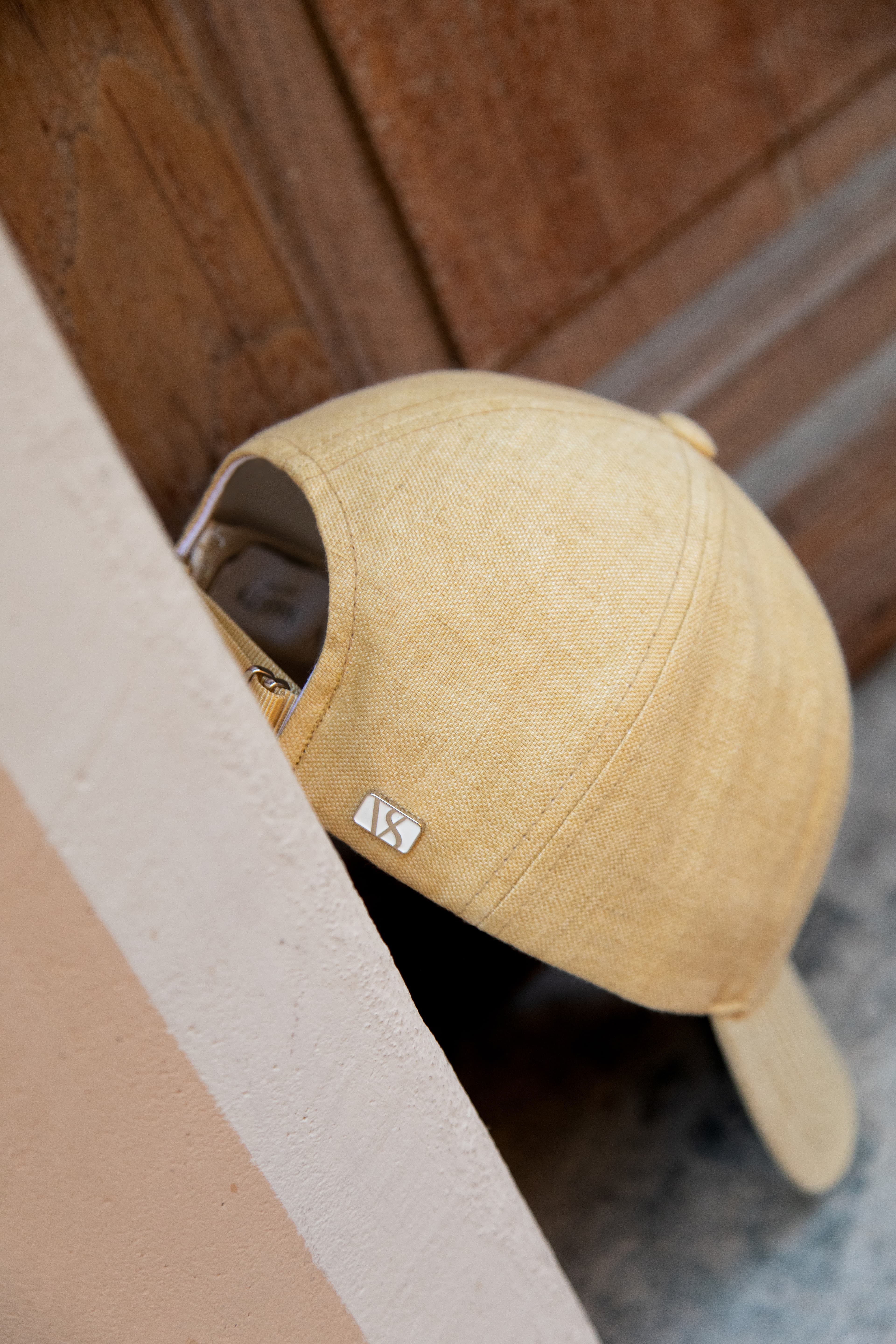 Back view of tuscany yellow linen cap