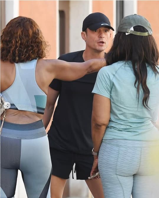 Oprah Winfrey running in Venice wearing Varsity Headwear French Olive Linen cap with tags still attached