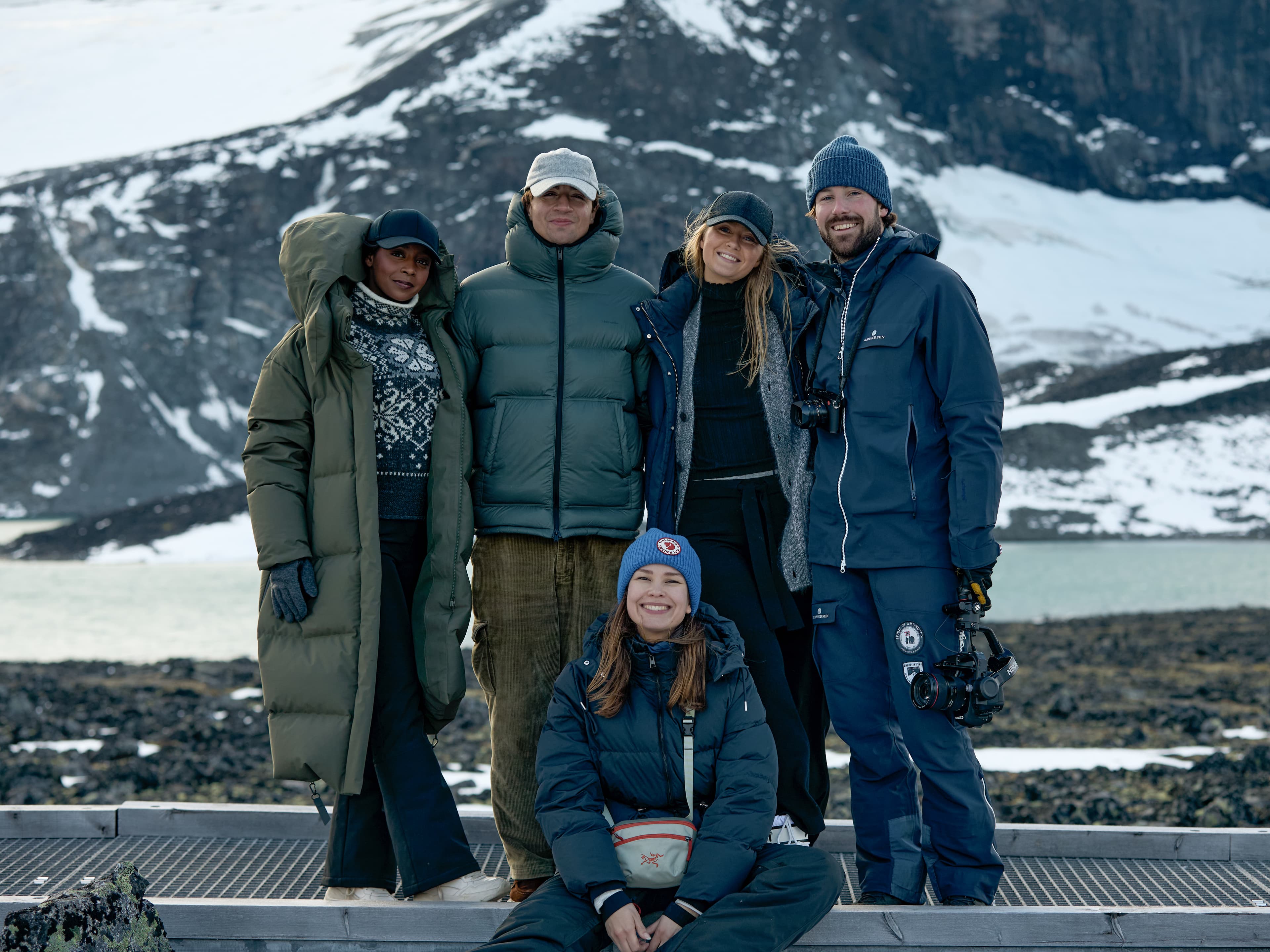 Group picture of VH team on photoshoot for Holiday24 campaign in Norwegian landscape