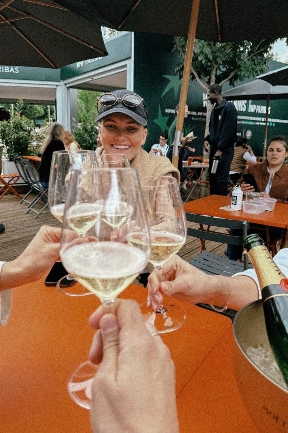 Owners Club winner toasting with champagne during a Paris experience.