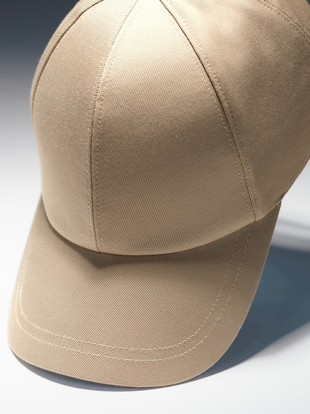 Close view of a beige sea island cotton cap from Varsity Headwear
