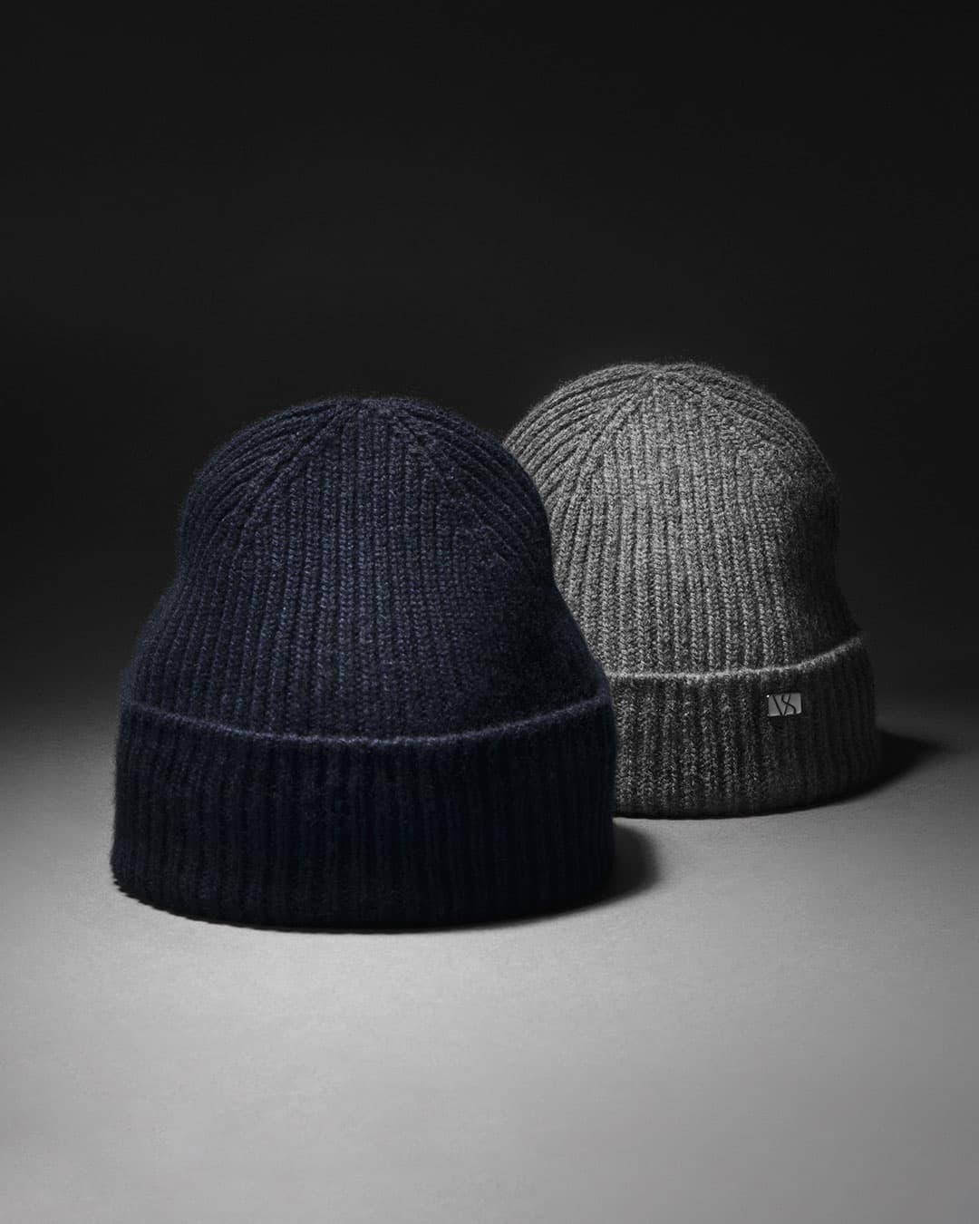 Front view of navy and grey cashmere wool blend beanies from varsity headwear