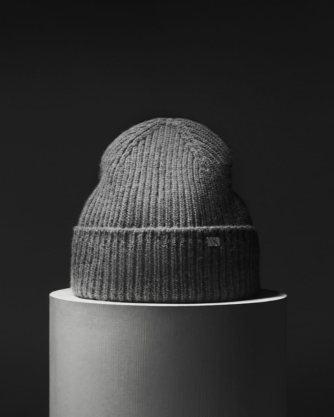 Front view of a grey cashmere merino wool blend beanie from varsity headwear