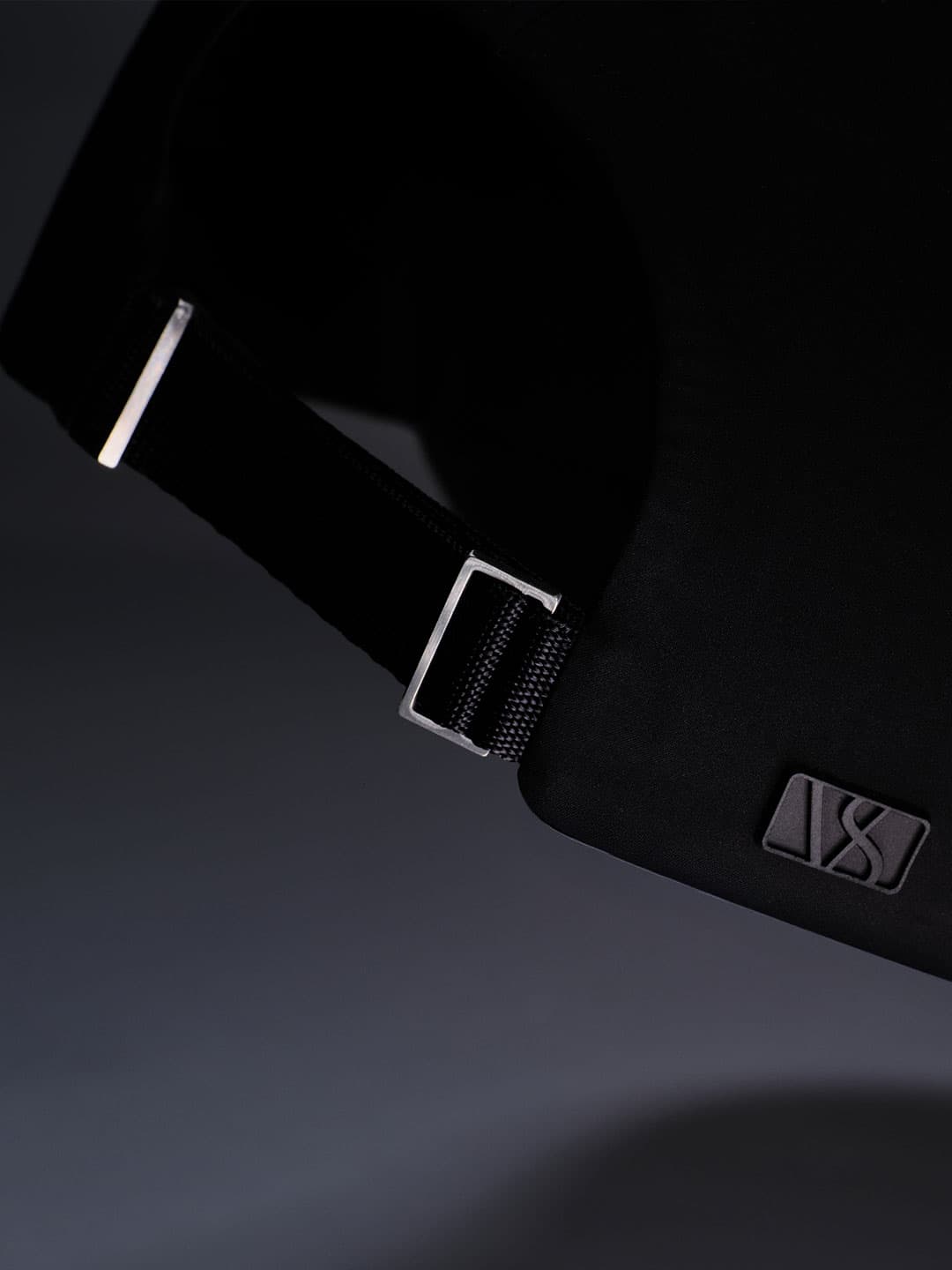 Detailed view of back strap og a low intensity sport cap from Varsity Headwear