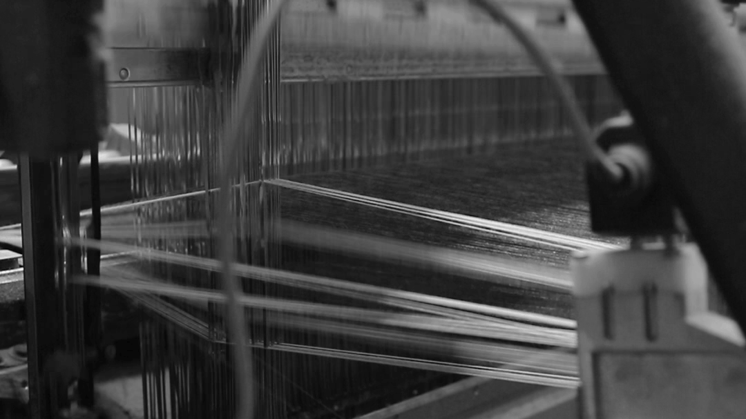 Video showing machine sewing material