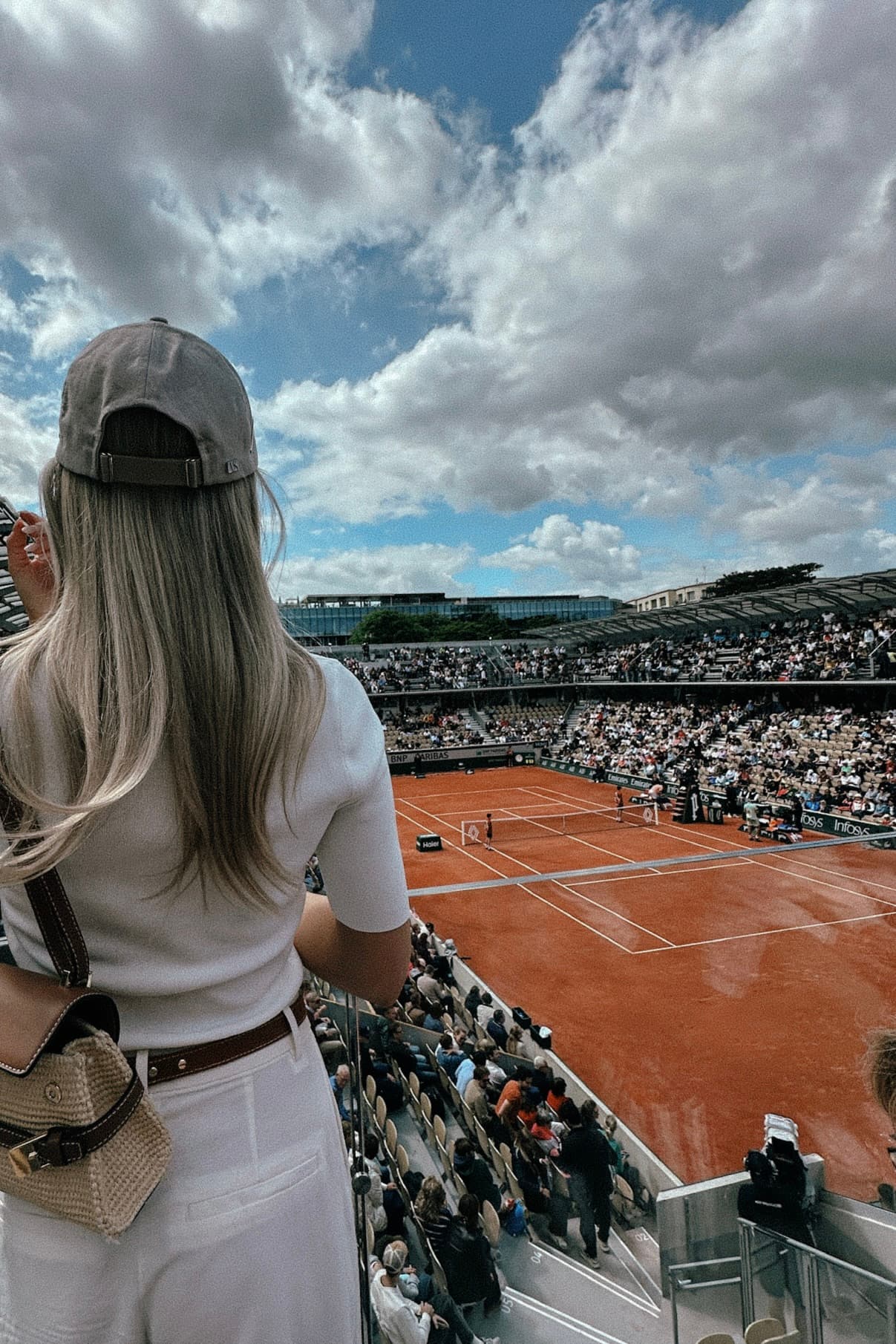 Owners Club winner watching tennis in Paris