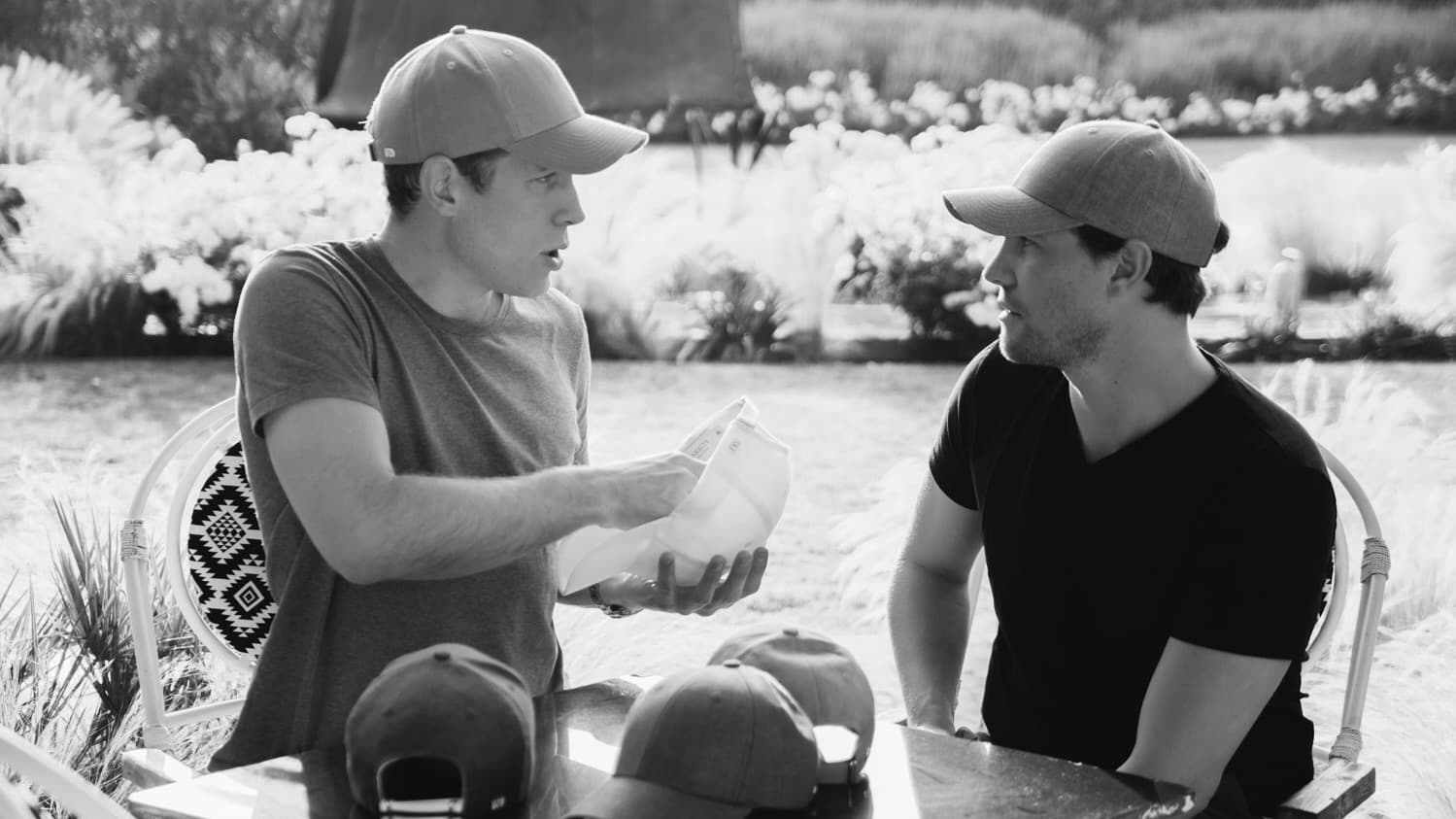 Founders of Varsity Headwear Alexander and Sebastian Adams discussing cap shapes