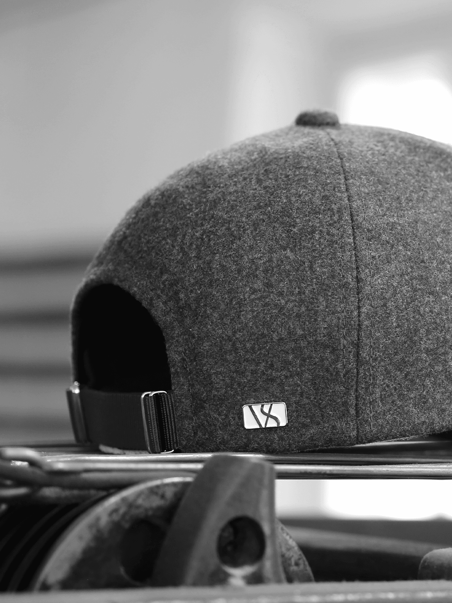 Back view of merino wool cap in black and white