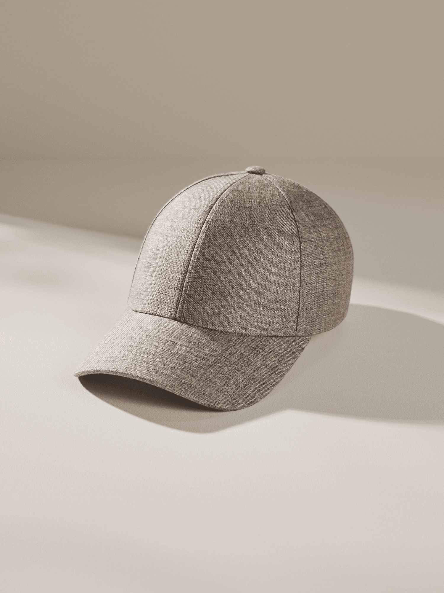 Studio image and front view of brown legacy structured linen cap