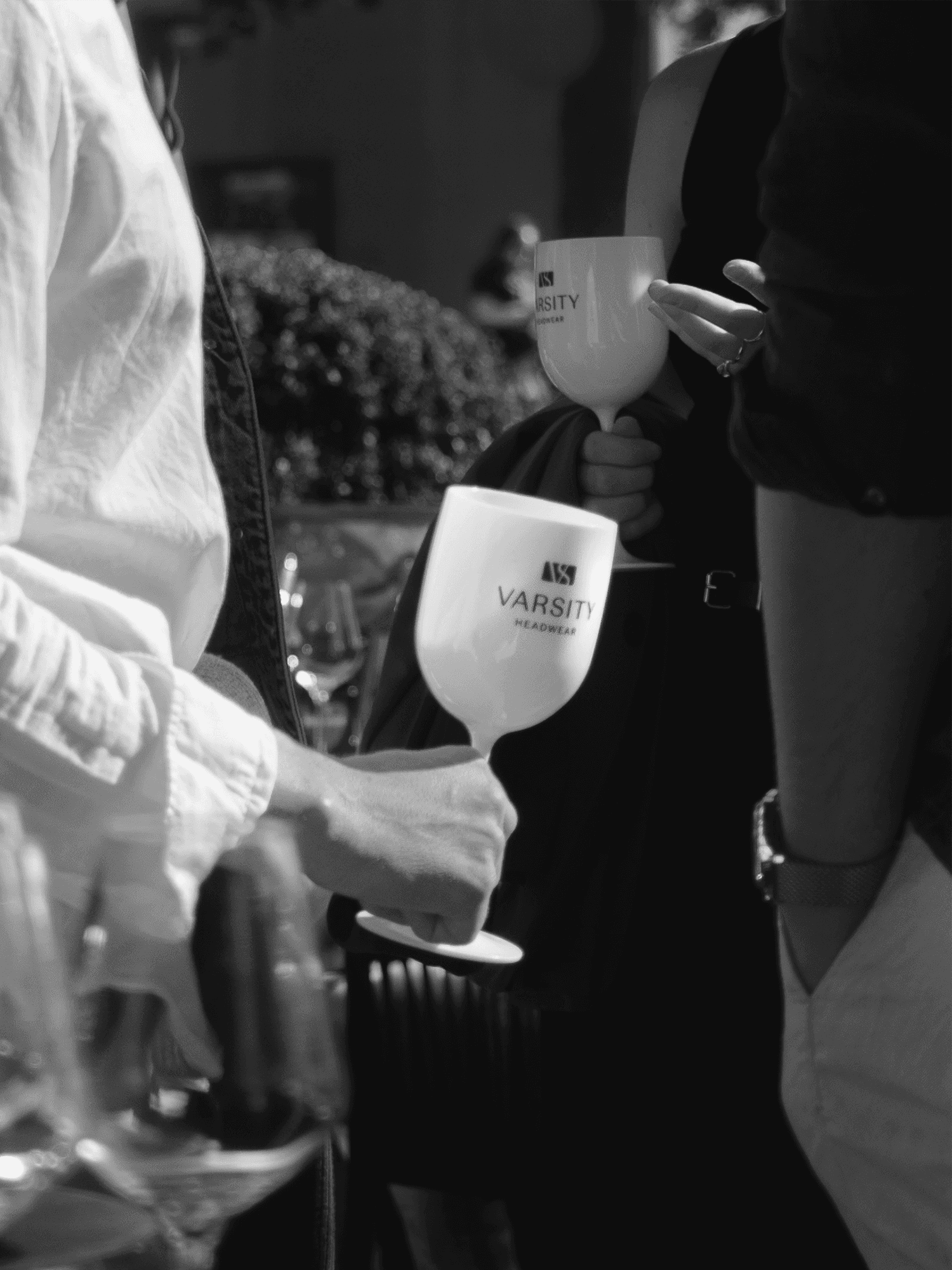 Environmental image of branded varstiy headwear wine glass