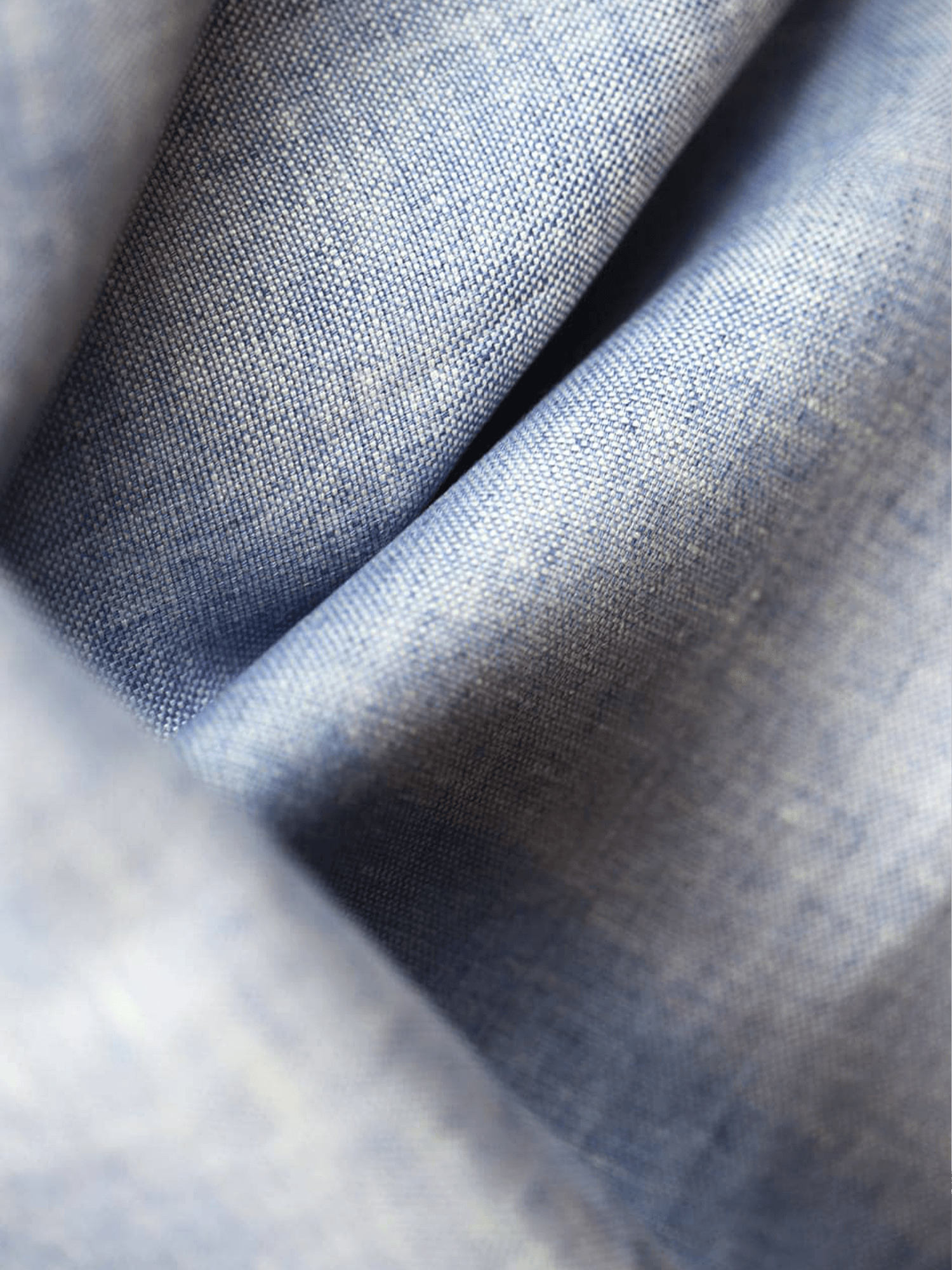 Close view of light blue linen fabric