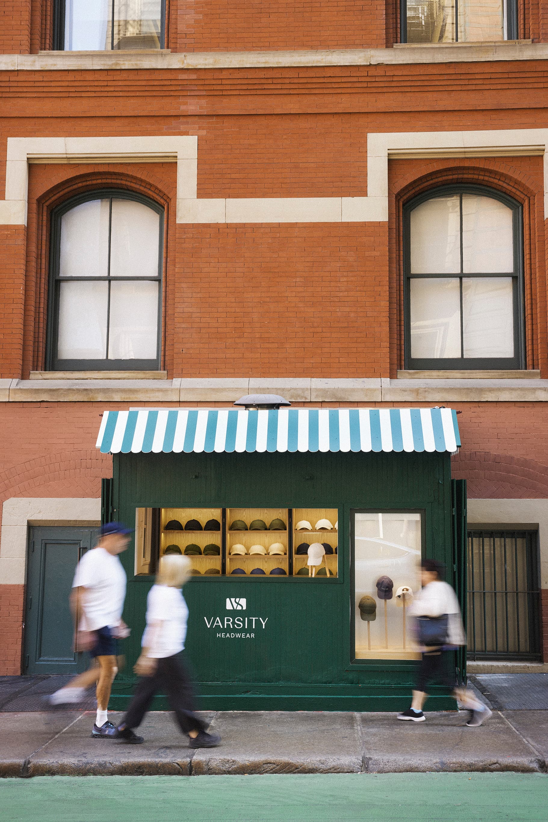Front view of Varsity headwear pop up in Soho NYC