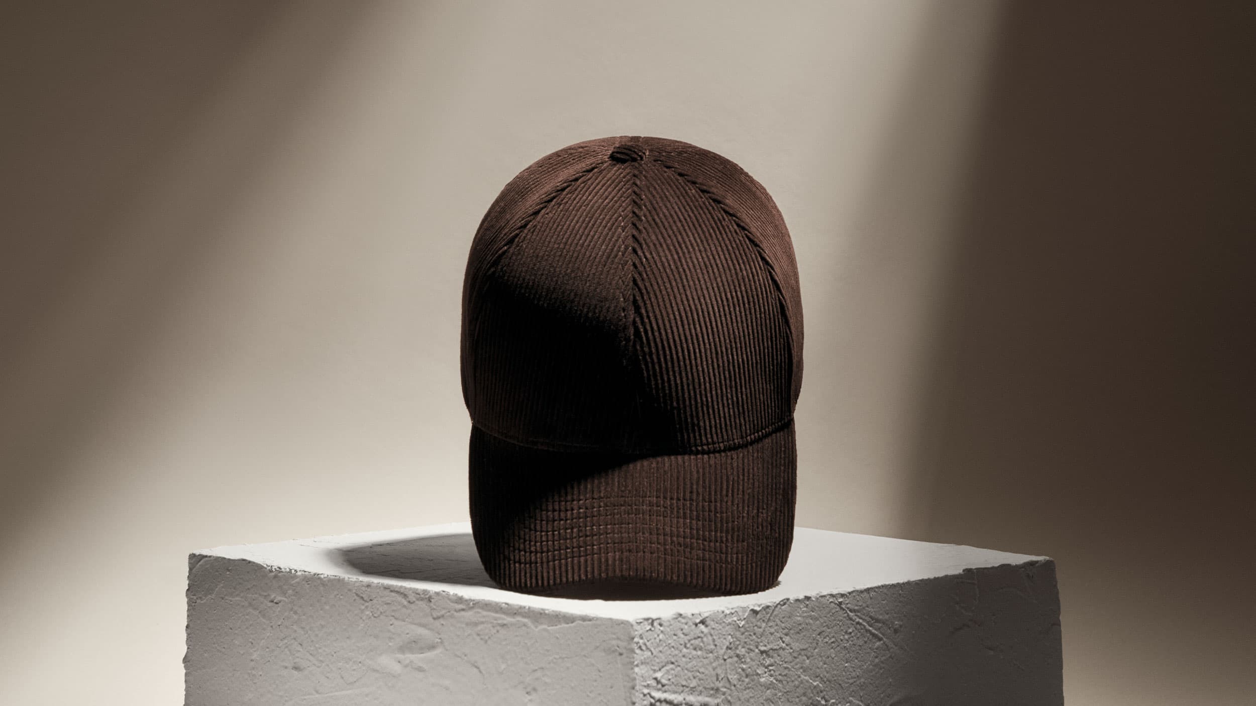 Front view of a brown legacy structured corduroy cap from varsity headwear