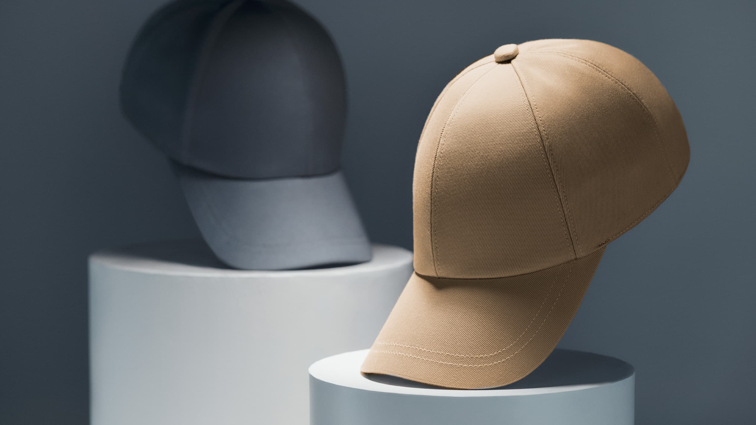 Front view of a sea island cotton cap in beige and blue from varsity headwear