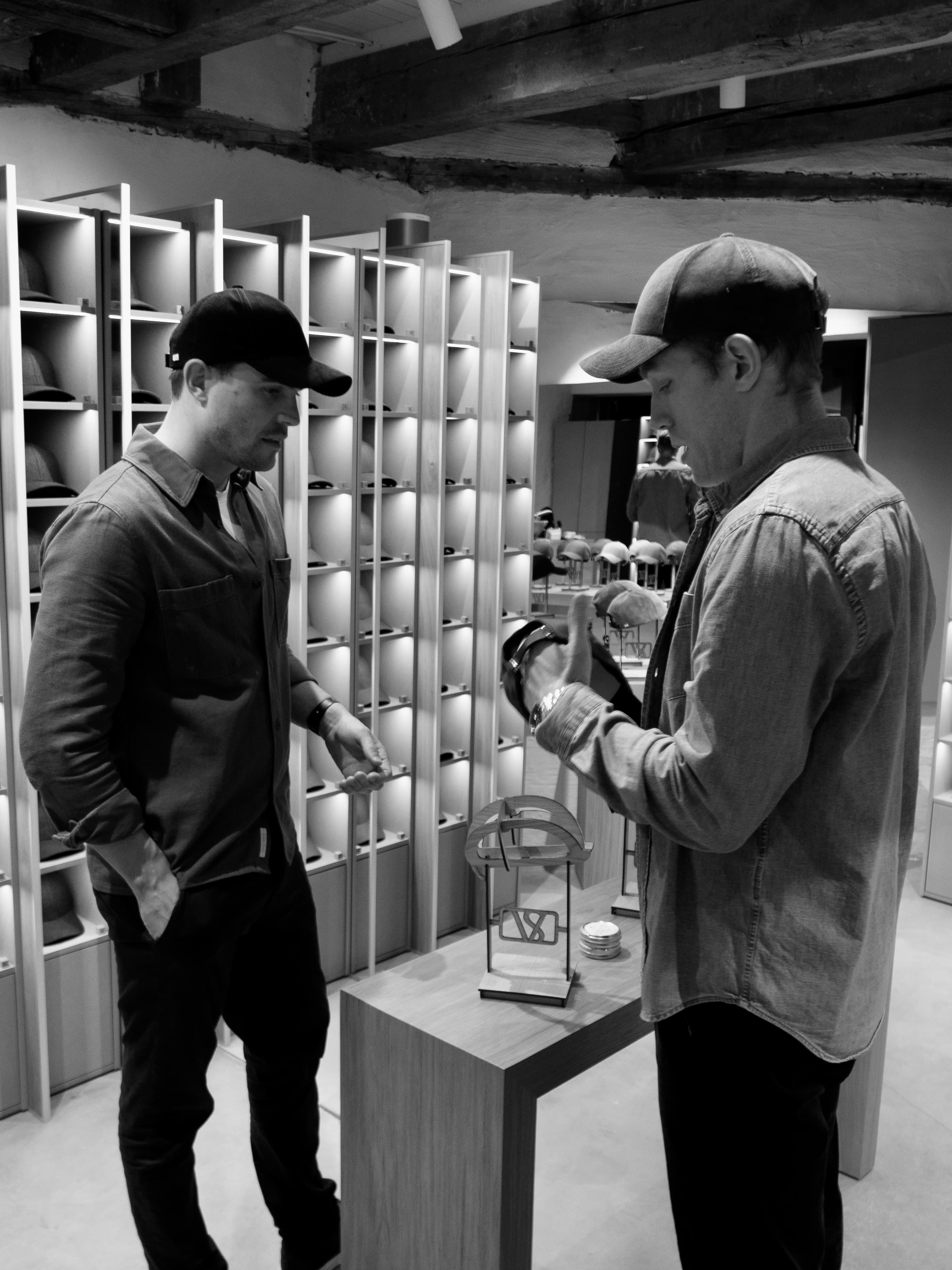Founders of Varsity Headwear Alexander and Sebastian Adams in their first store in Oslo
