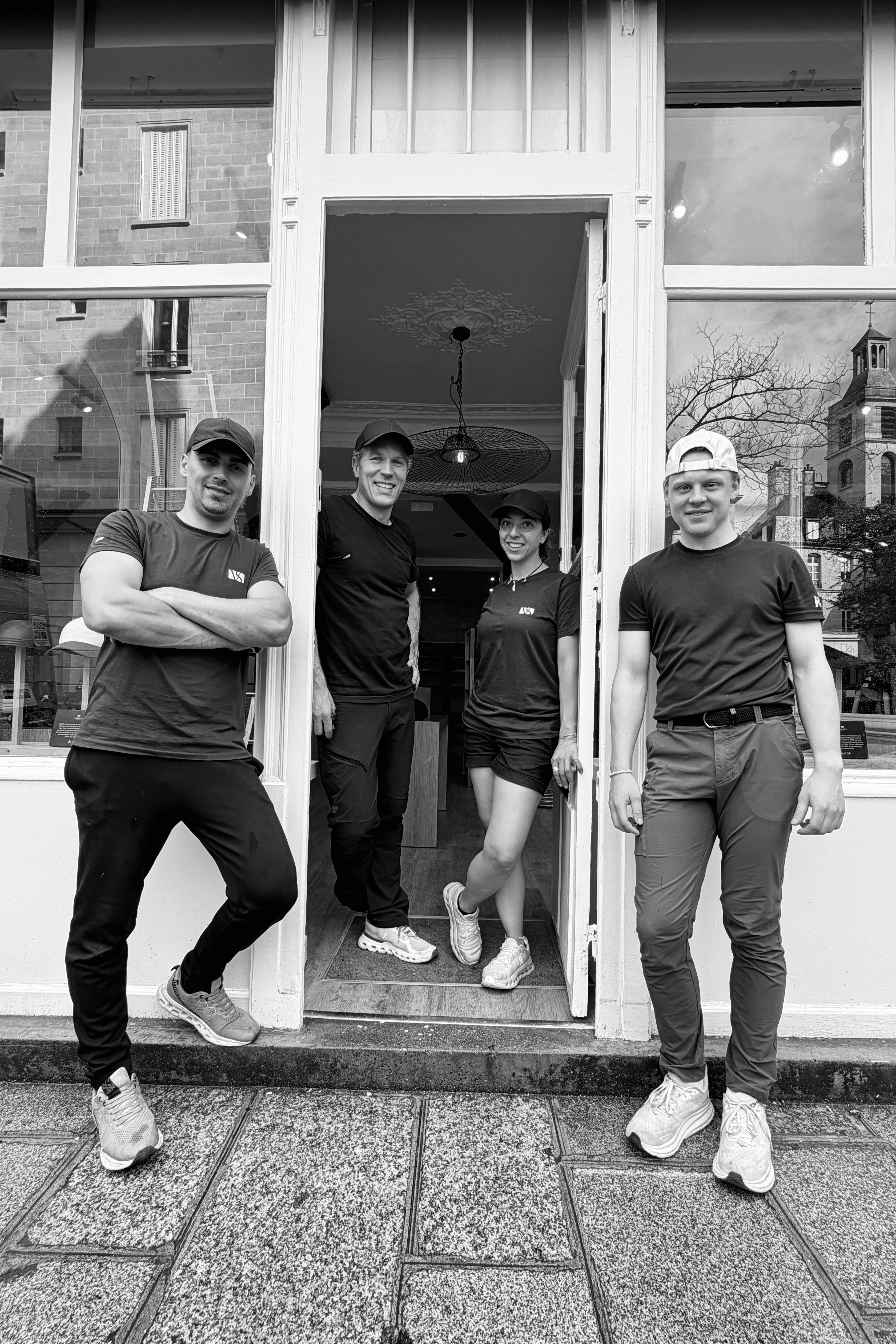 Varsity Headwear team in front of store in Paris