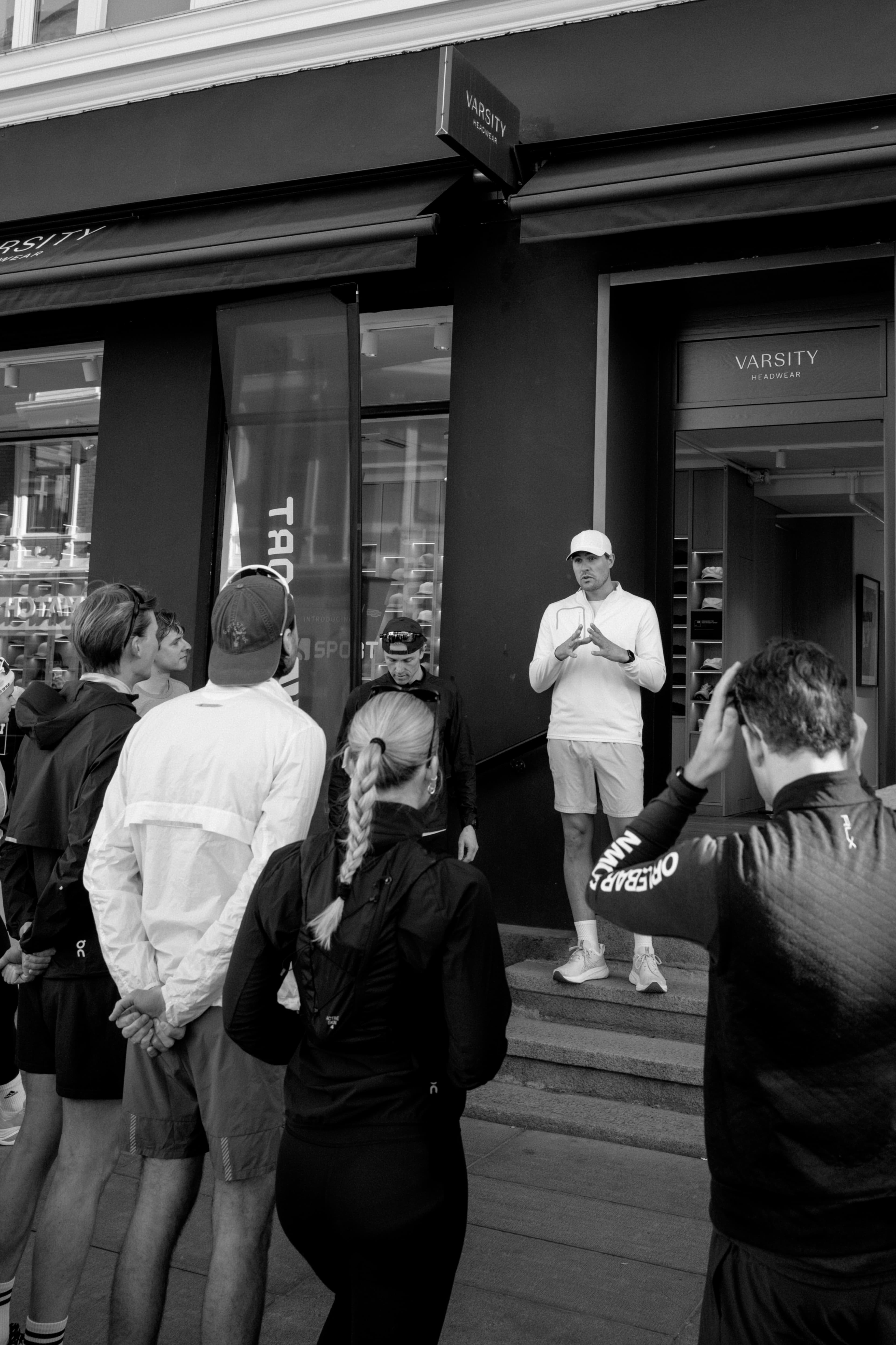 Founder of Varsity Headwear Alex hosting a social run outside the flagship store in Oslo, Norway