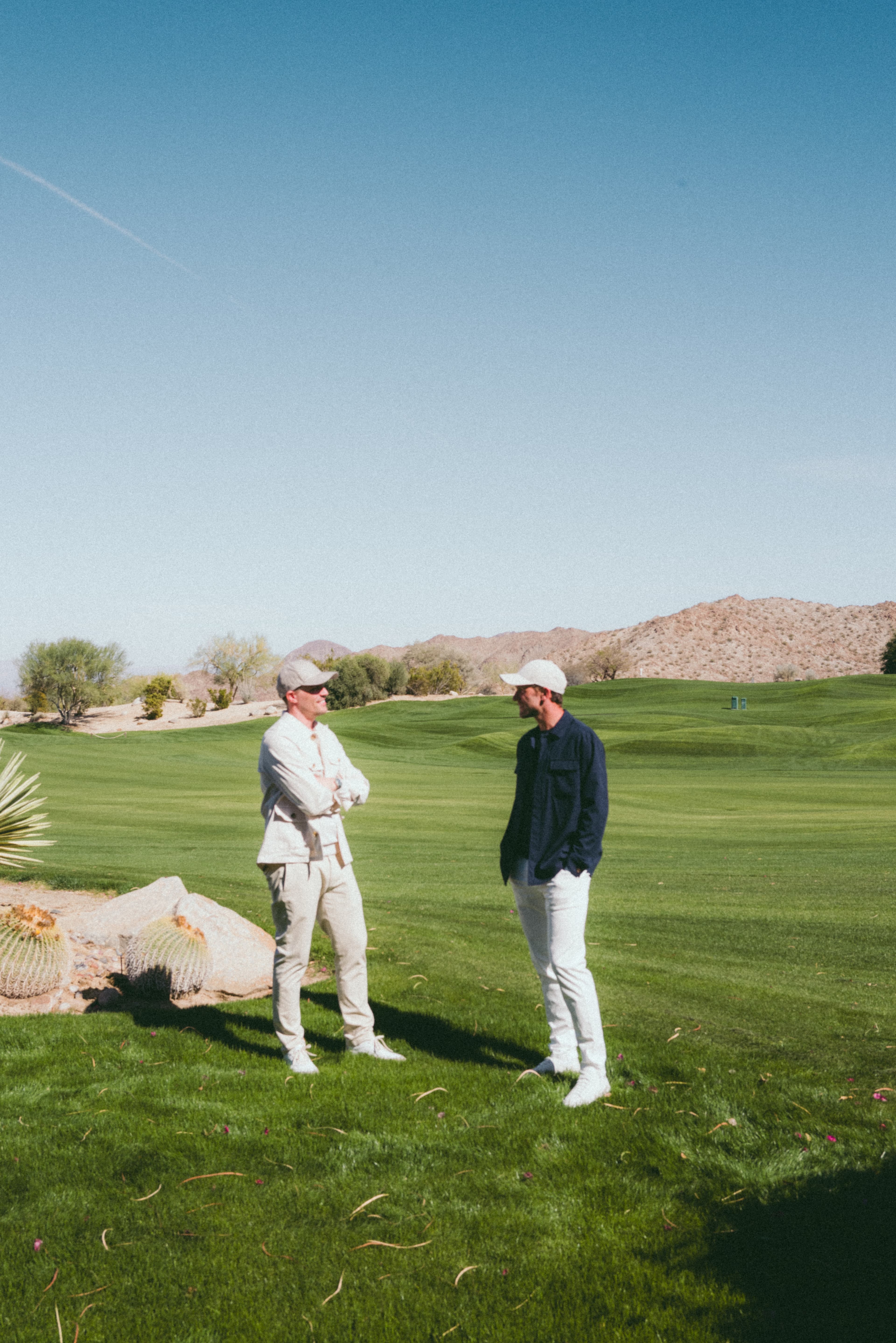 Casper Ruud and founder of Varsity Headwear Alexander Adams at campaign shoot for the collaboration on the off-court cap