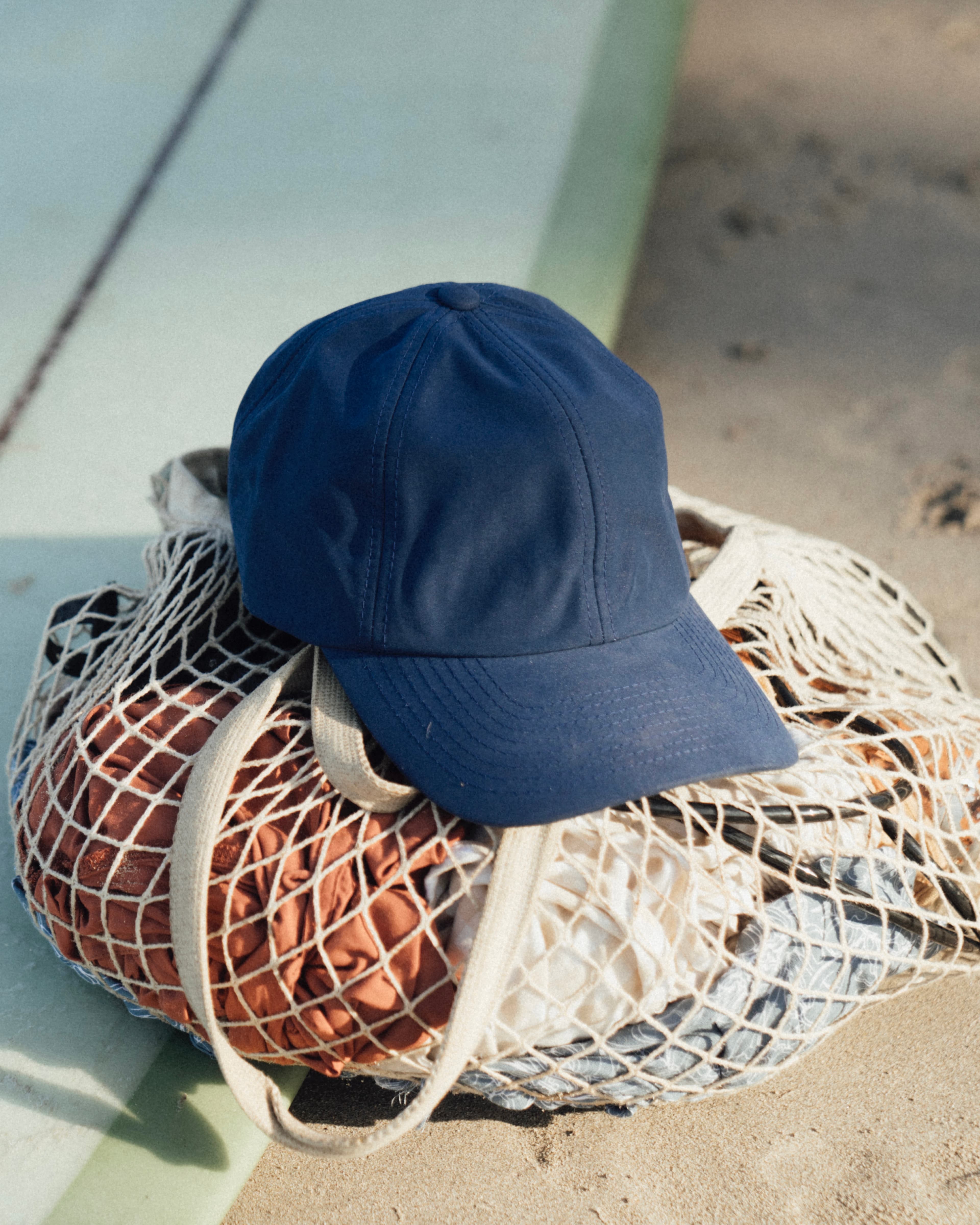Blue seaqual cap at beach