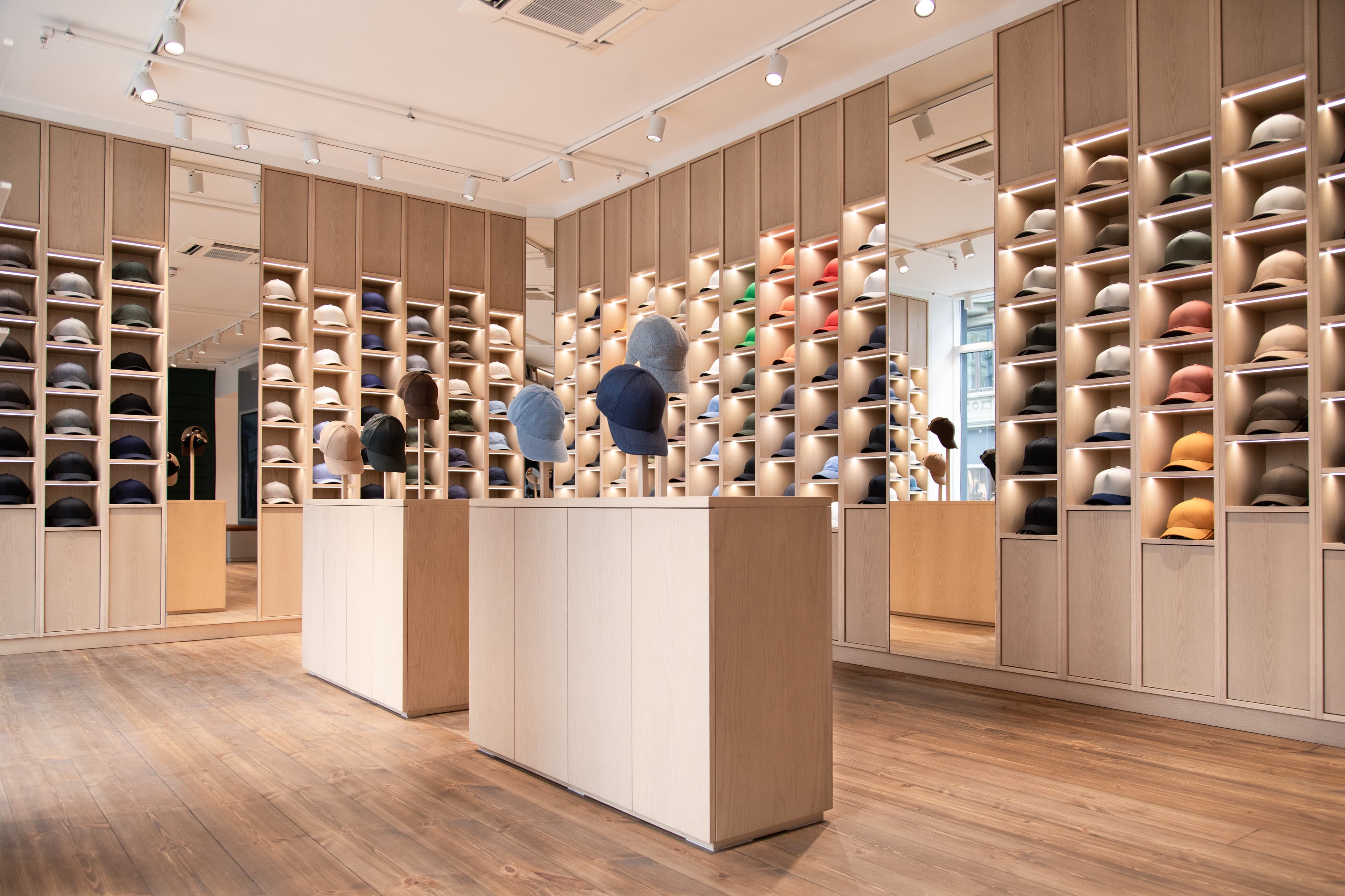 View of caps in Varsity headwear concept store in Oslo Norway