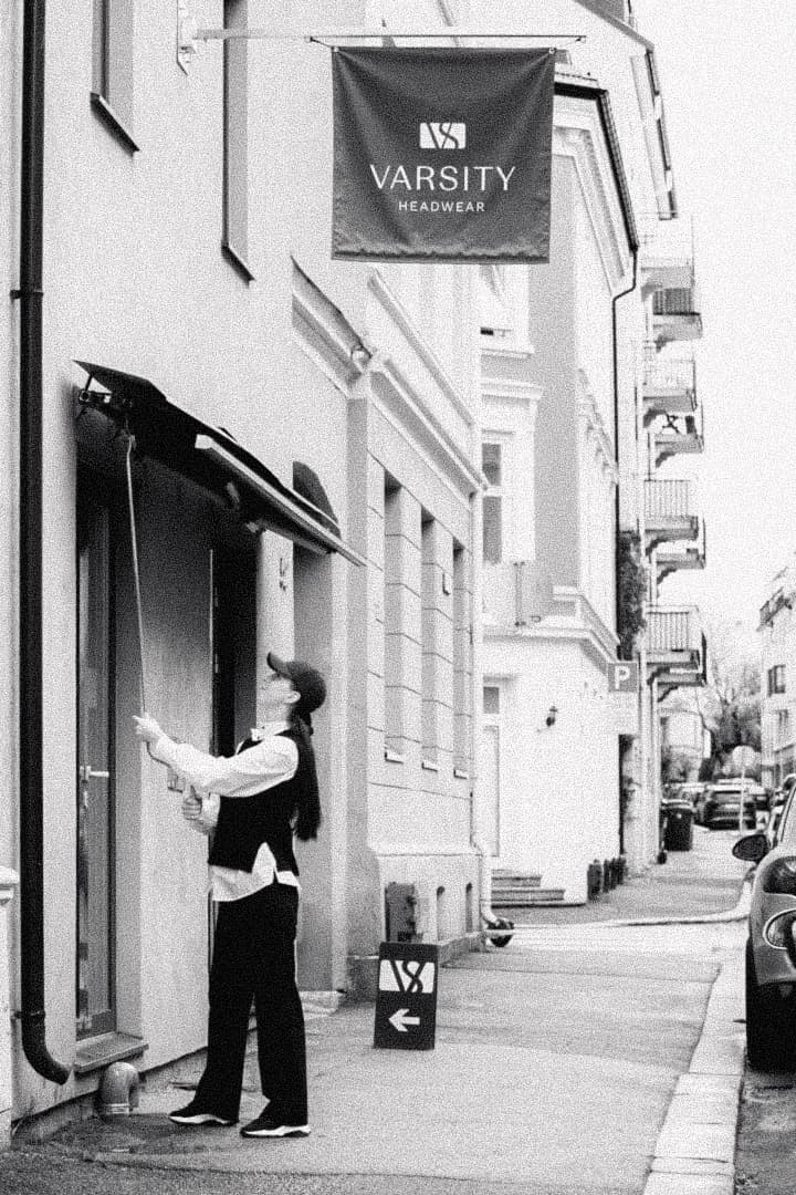 Outside of Varsity Headwear first Oslo Store with their signature flag