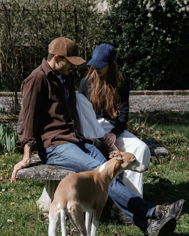 Side view of female and male model wearing macchiato brown alcantara cap