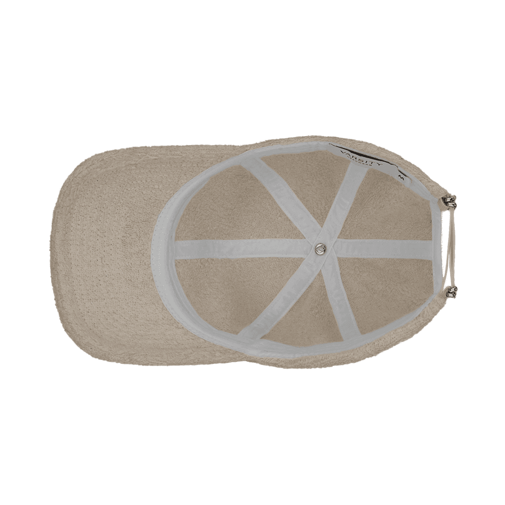 Inside view of a Varsity Headwear legacy soft beige terry cloth baseball cap